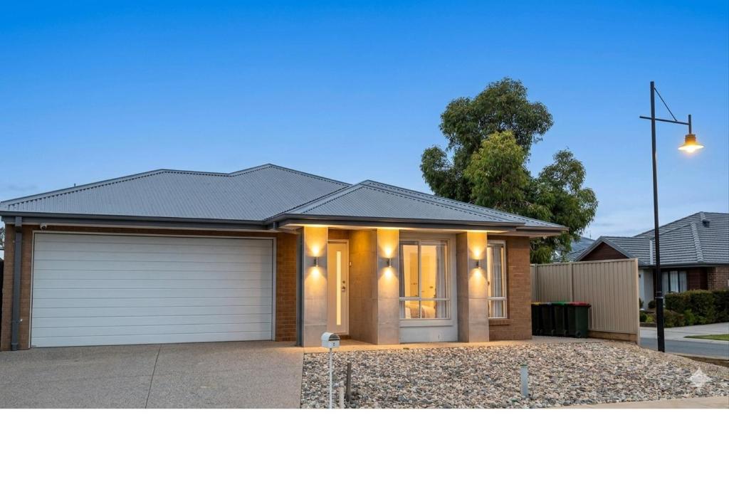 a house with a garage on a street at PONZ Lake Retreat - Nagambie in Nagambie