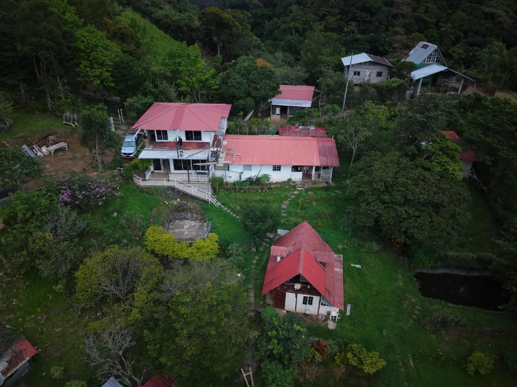 an aerial view of a house with a red roof at Cabaña vista Volcán Barú in Gualaca