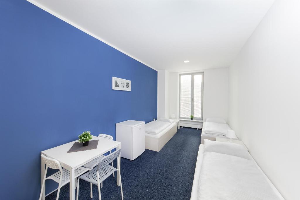 Postel nebo postele na pokoji v ubytování Hotel & Hostel Letov