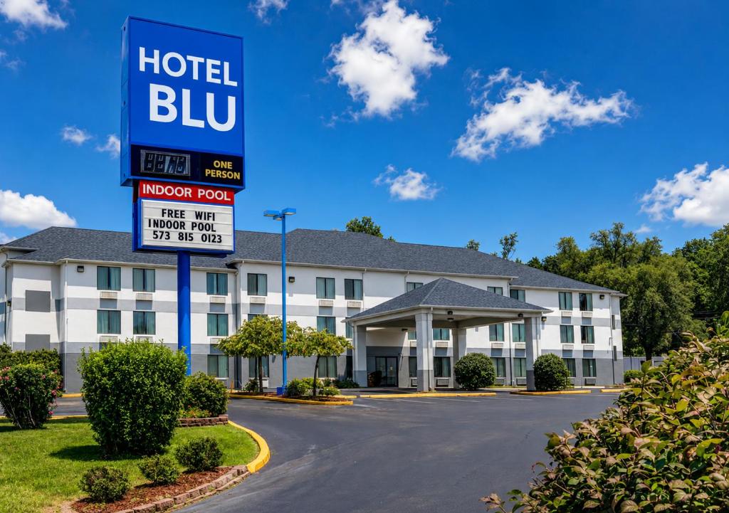a hotel flu sign in front of a hotel at Hotel Blu in Columbia