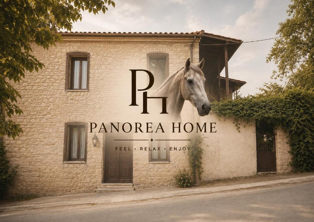 a horse is standing in front of a building at Panorea house in Polydrossos