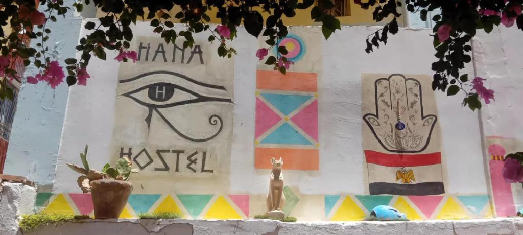 a wall with paintings on the side of it at Hana hostel not for Egyptian in Hurghada