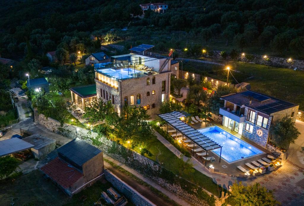 an aerial view of a house with a swimming pool at Apart & Spa Beganovic in Dobra Voda