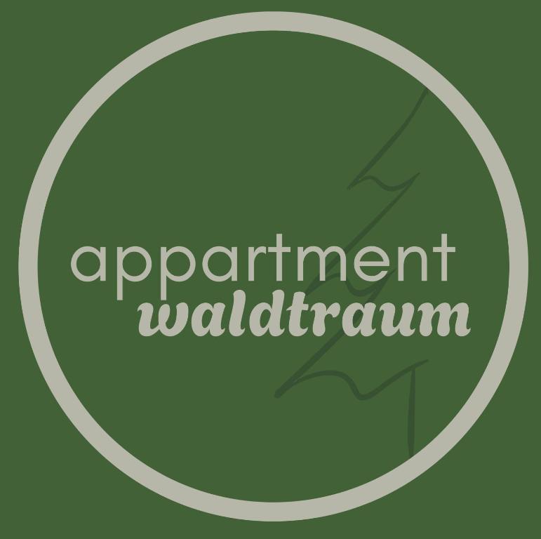 a circle with the words appointment walnut walnutium at Appartment Waldtraum in Au im Bregenzerwald