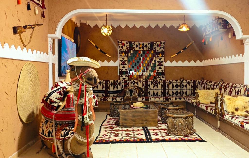 a store with a room filled with lots of furniture at La Casa Beduina Hostel in Riyadh