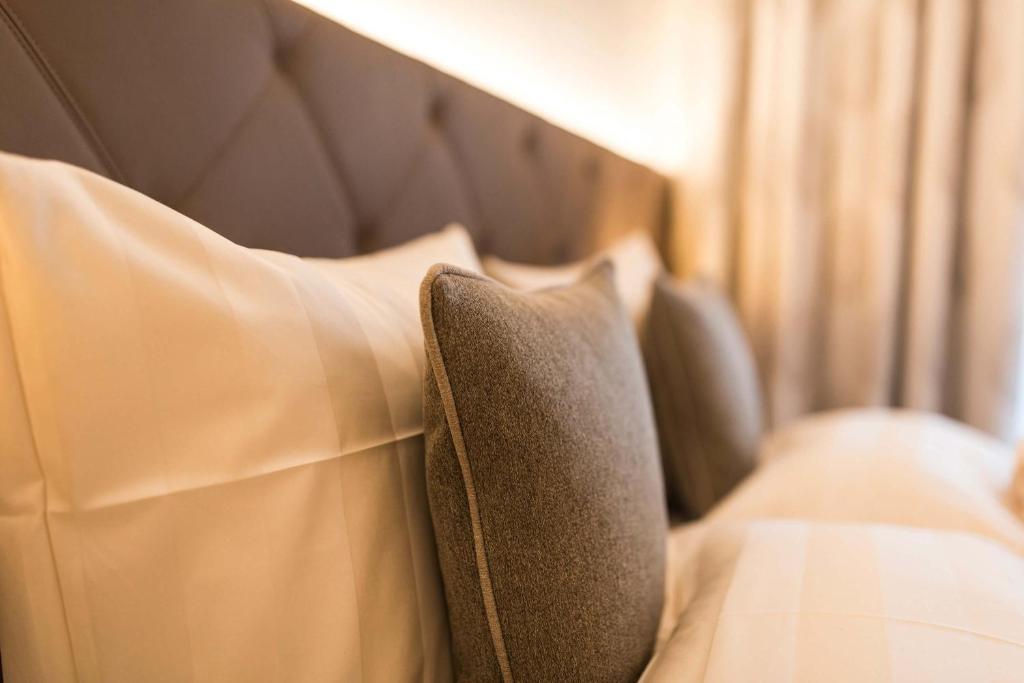 Posteľ alebo postele v izbe v ubytovaní Slow Living Suite - Ferienwohnung mit privater Sauna & Garten