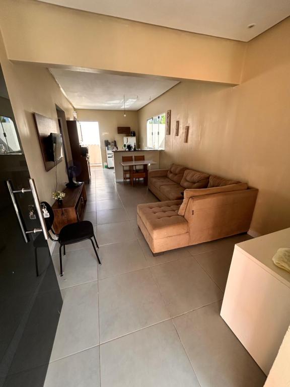 a living room with a couch and a table at New progress, it's Félix! in Marabá