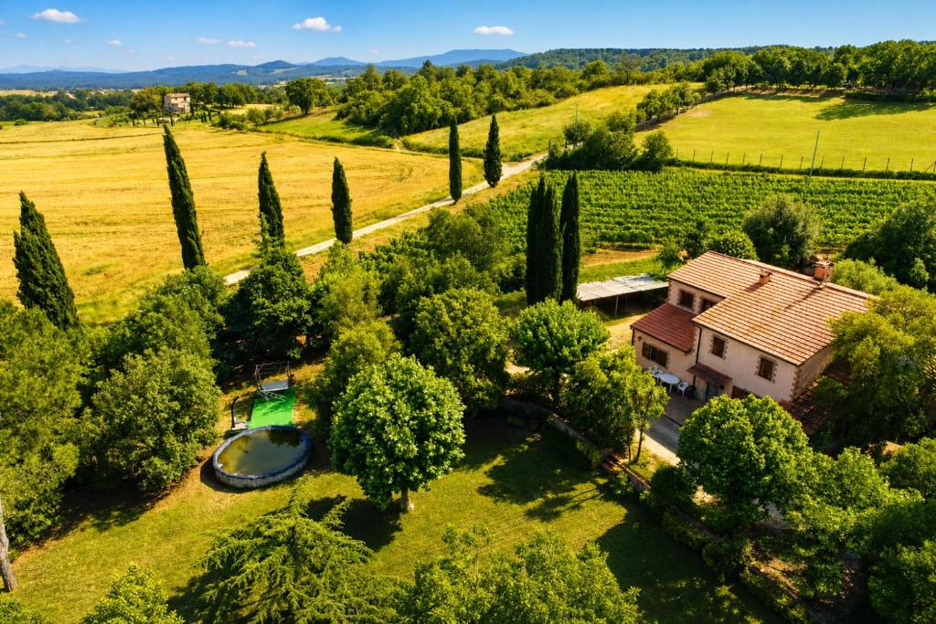 an aerial view of a villa with a garden and a house at Tenuta Di Litiano Villa with Garden and Pool - Happy Rentals in Roccastrada