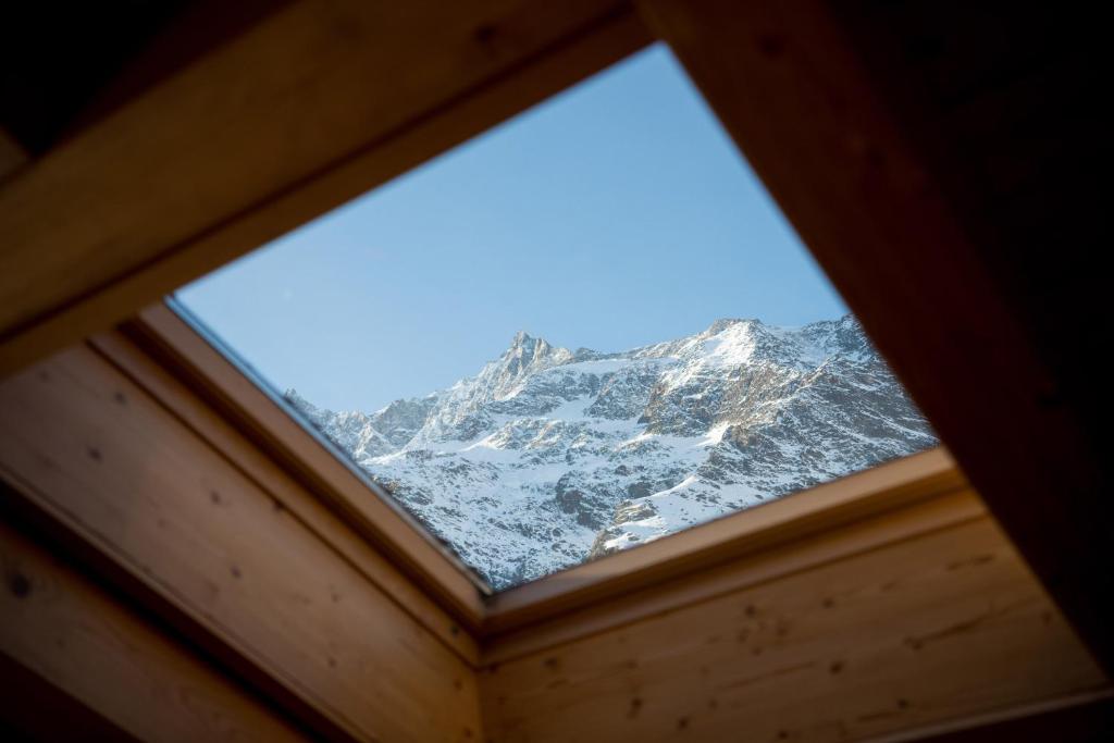 Nespecifikovaný výhled na hory nebo výhled na hory při pohledu z apartmánu