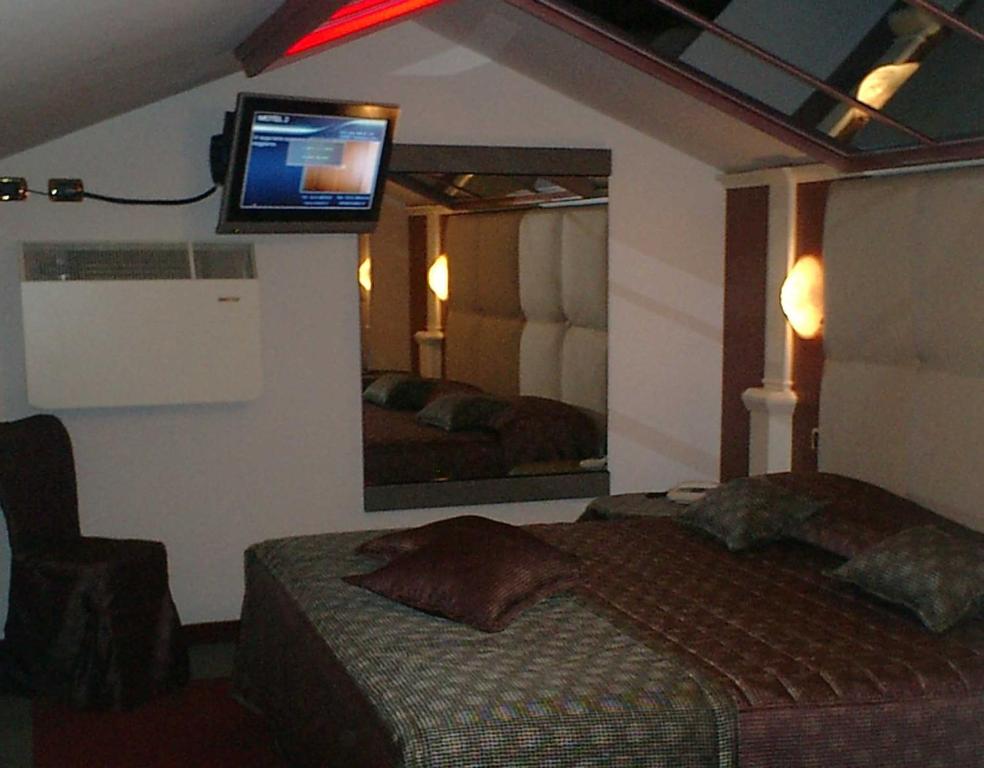 Postel nebo postele na pokoji v ubytování Hotel Motel 2
