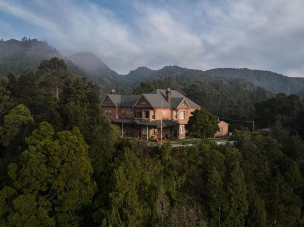 a house on top of a hill in the mountains at Penghana Bed and Breakfast in Queenstown