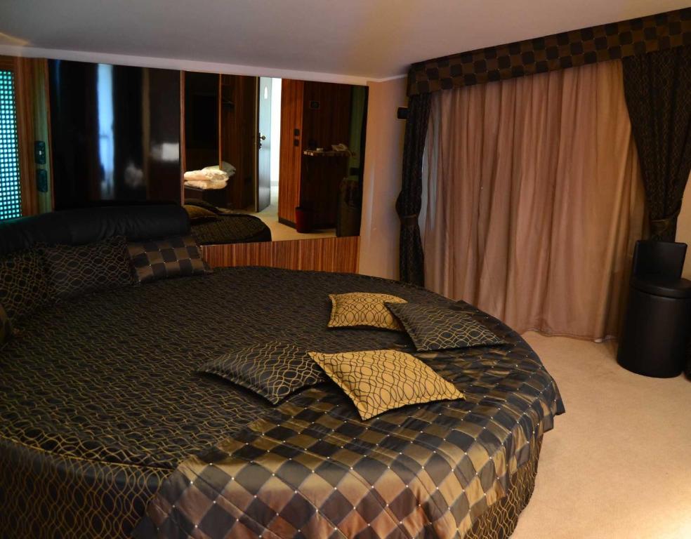 Postel nebo postele na pokoji v ubytování Hotel Motel 2