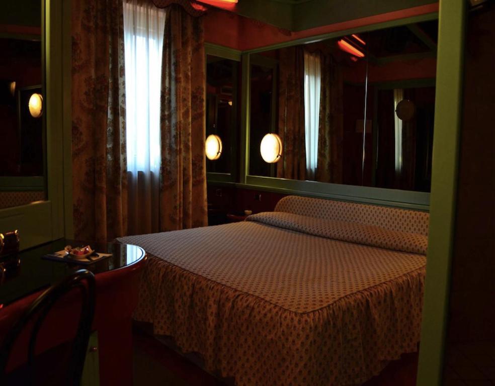 Postel nebo postele na pokoji v ubytování Hotel Motel 2