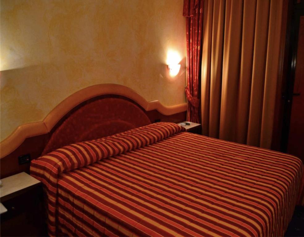 Postel nebo postele na pokoji v ubytování Hotel Motel 2