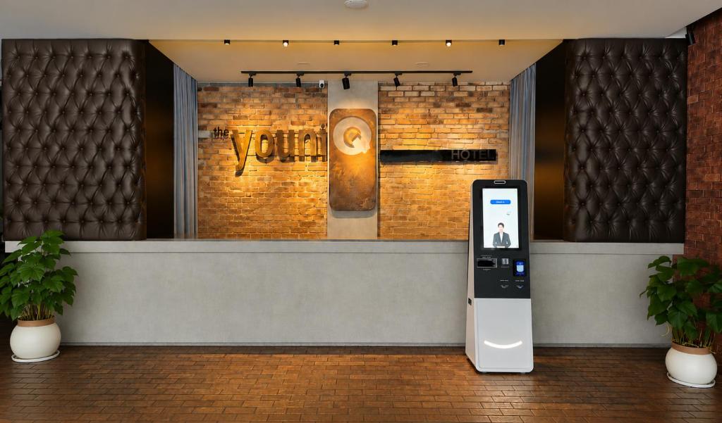 a cell phone is sitting in front of a store at the youniQ Hotel, KLIA T1, KLIA T2 in Sepang