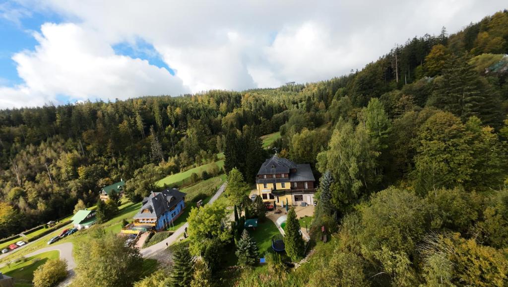 an aerial view of a house in the mountains at Lucni Dum in Janske Lazne