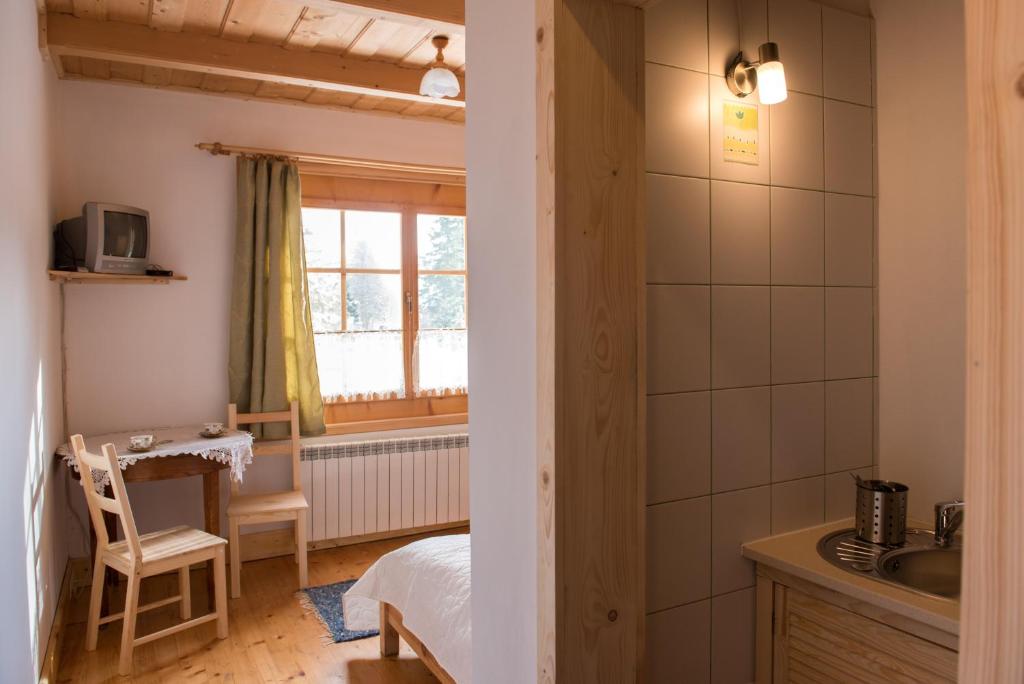 Kuchyňa alebo kuchynka v ubytovaní Willa Jedlicka