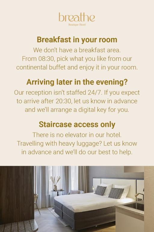 a bedroom with a bed with a wall that reads breakfast in your room we dont at Breathe Boutique Hotel in Leiden