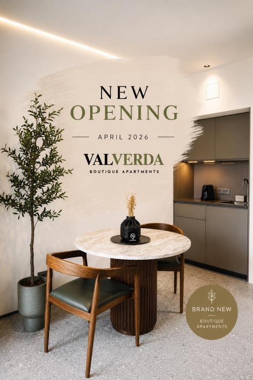a new opening sign on the wall of a kitchen at Valverda - Boutique Apartments in Grödig