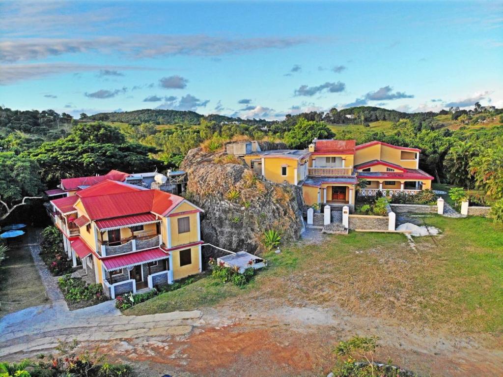a group of houses on top of a hill at Gîte Le Tropical in Rodrigues Island