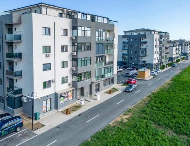 an aerial view of a city street with buildings at AKT Residence in Agigea