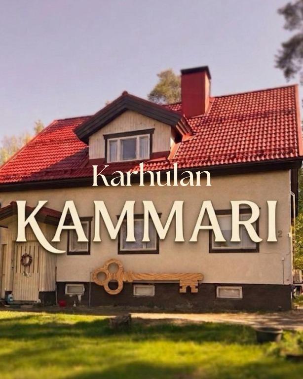 a house with a sign that says karin istg at Karhulan Kammari, oma sisäänkäynti ja WC, Valkeakoski keskusta in Valkeakoski