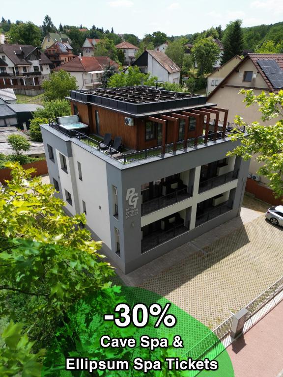 an image of a house with a roof at Park Central Tapolca - Apartments in Miskolctapolca