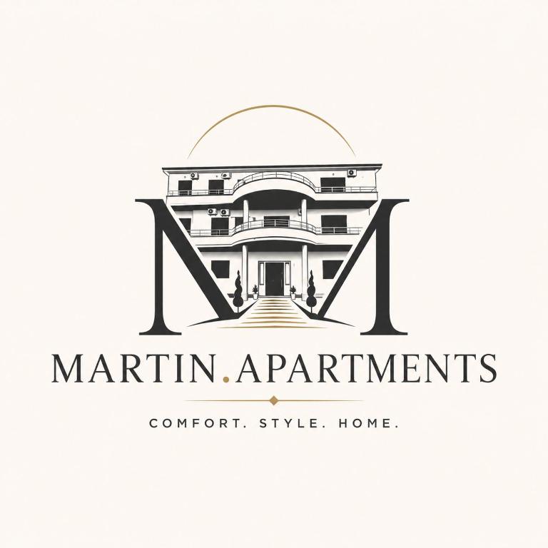 a black and white logo for a apartment building at Martin Apartments in Gornji Štoj