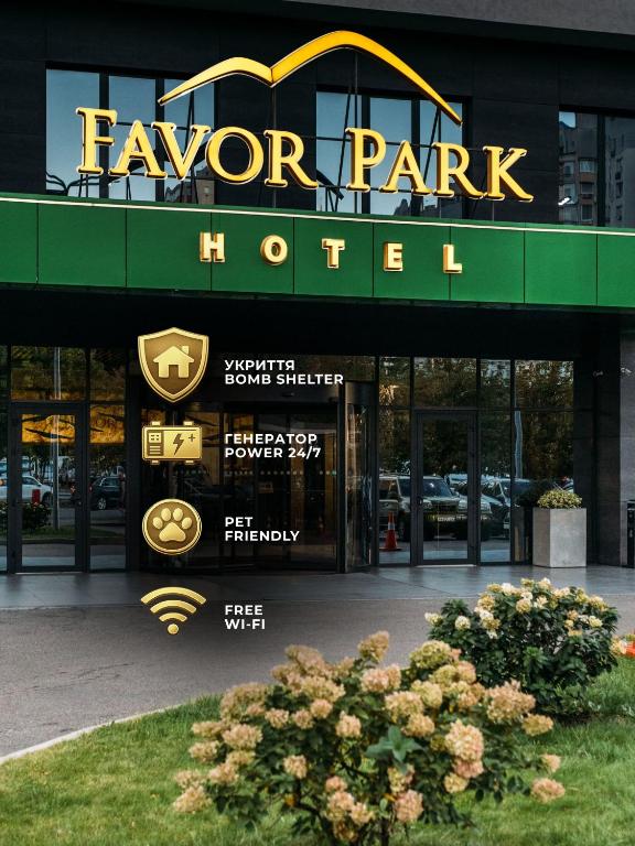 a sign on the front of a hotel at Favor Park Hotel in Kyiv