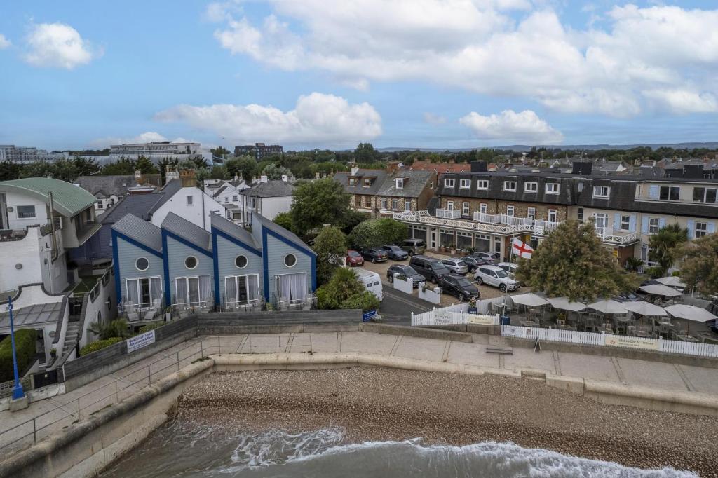 a view of a town with a river and buildings at The Beachcroft Hotel, BW Signature Collection in Bognor Regis