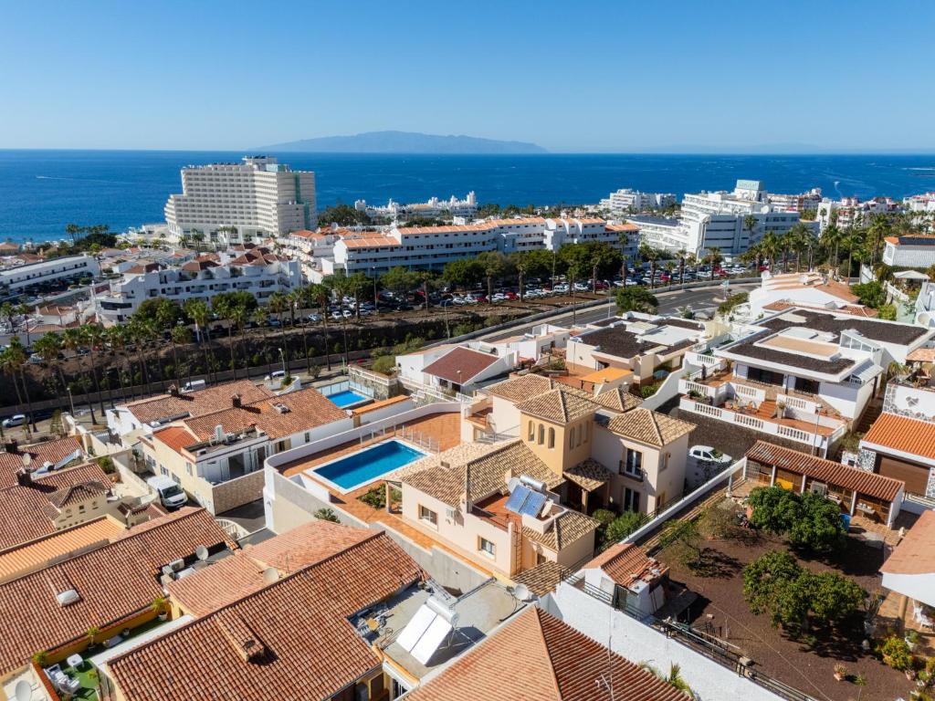an aerial view of a city with buildings at Villa Evita Private Pool, Jacuzzi & Sea views in Adeje