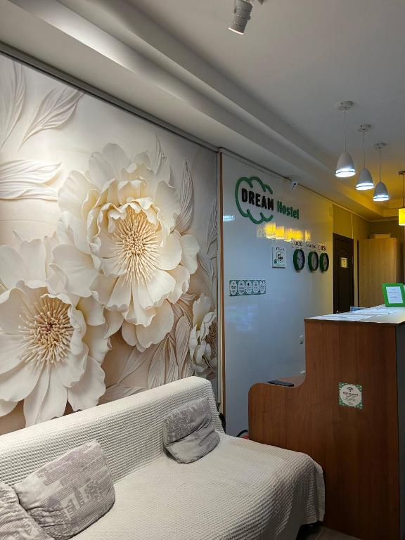 a hospital room with a flower mural on the wall at Dream Hostel Odessa in Odesa