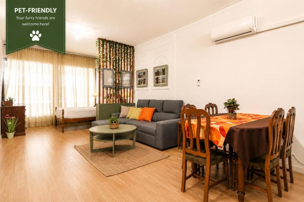a living room with a couch and a table at Bom Braga AL in Braga