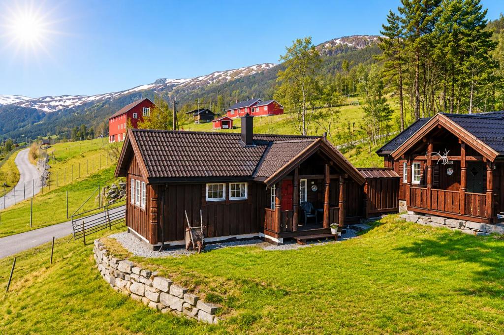 an aerial view of a house in a mountain at Cottage Yard - cozy Cabin in Geilo