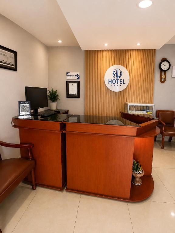 a lobby of a hospital with a reception desk at Hotel Urak in Valledupar