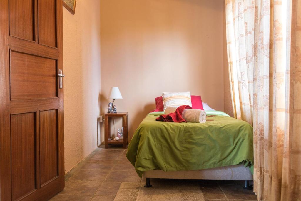Postel nebo postele na pokoji v ubytování Sunset Villa