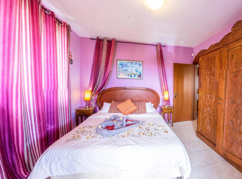 Postel nebo postele na pokoji v ubytování Sunset Villa