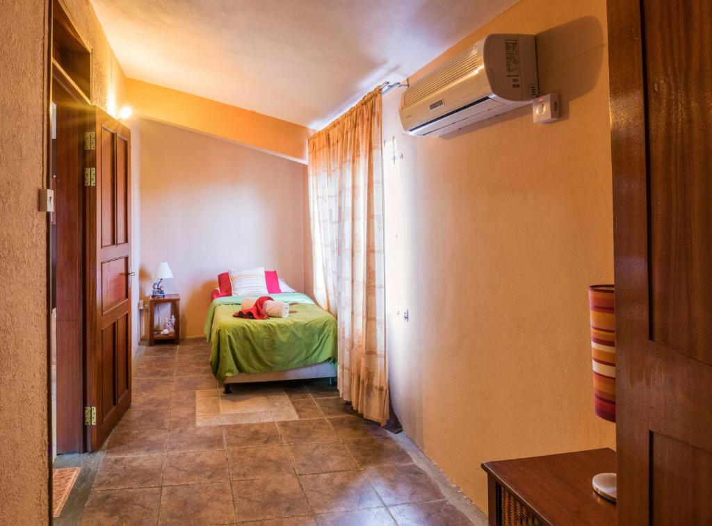 Postel nebo postele na pokoji v ubytování Sunset Villa