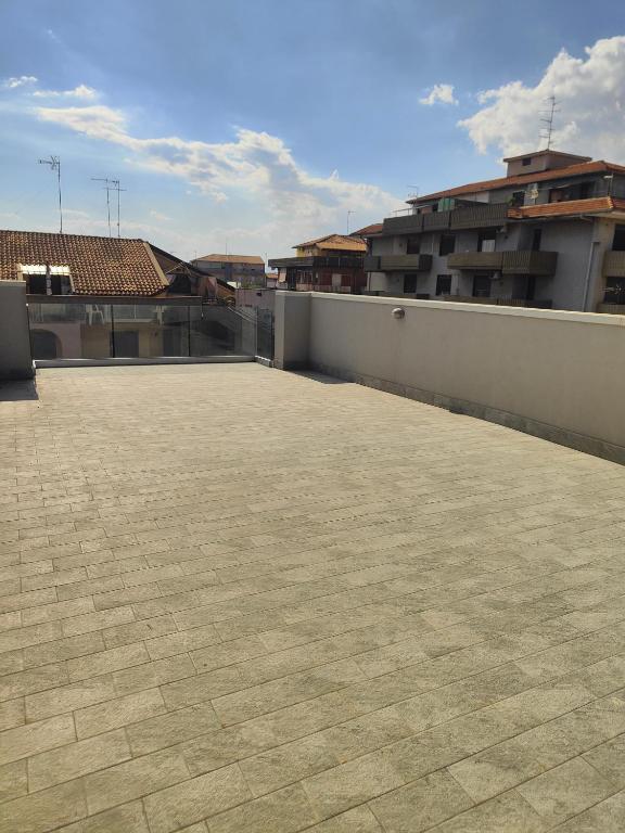 a large patio on top of a building at AnnAmuri appartamento 23 in Belpasso