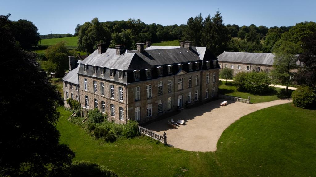 an aerial view of a large building in a field at Château de Saint-Pois in Saint-Pois