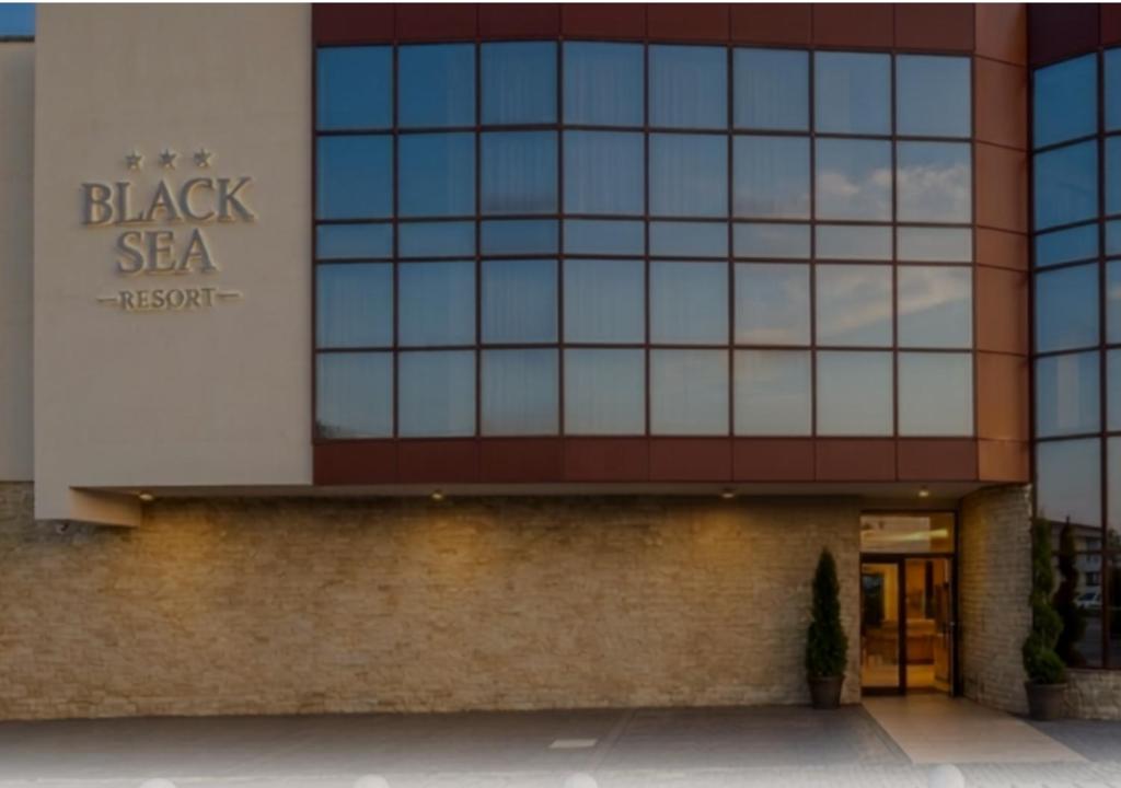 a building with a sign that reads black sea resort at Black Sea Resort in Eforie Sud