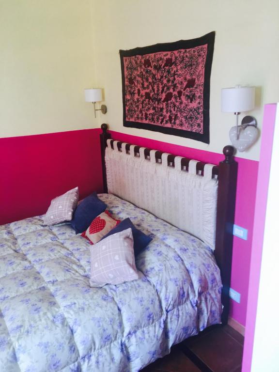 Postel nebo postele na pokoji v ubytování Mondello Room