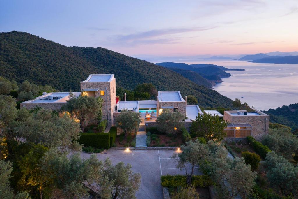an aerial view of a building on top of a mountain at Atrium Villas in Kechria