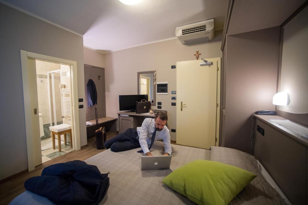 TV a/nebo společenská místnost v ubytování Hotel Lilla'