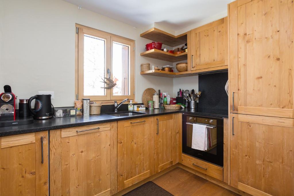 Kuchyň nebo kuchyňský kout v ubytování Apartments Roxes