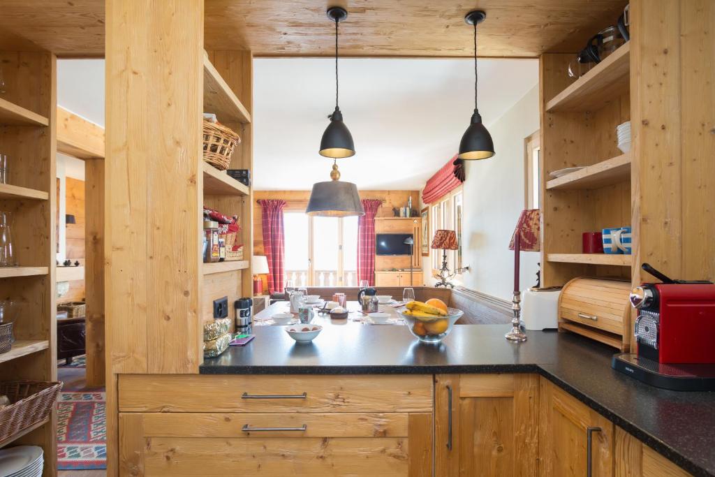 Kuchyň nebo kuchyňský kout v ubytování Apartments Roxes