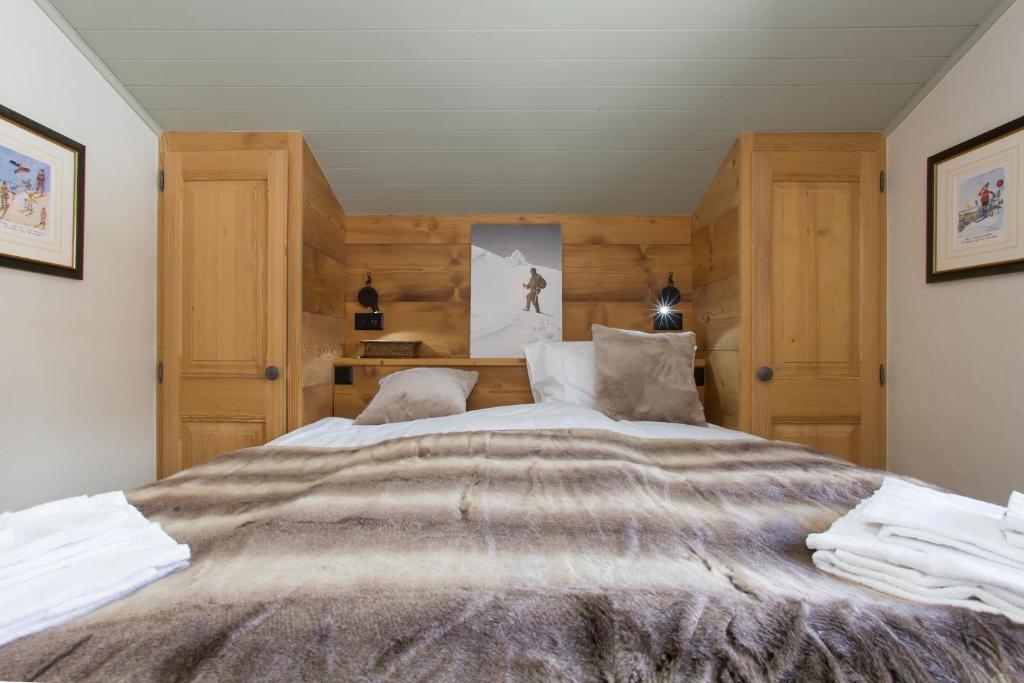 Postel nebo postele na pokoji v ubytování Apartments Roxes