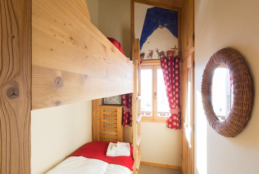 Postel nebo postele na pokoji v ubytování Apartments Roxes