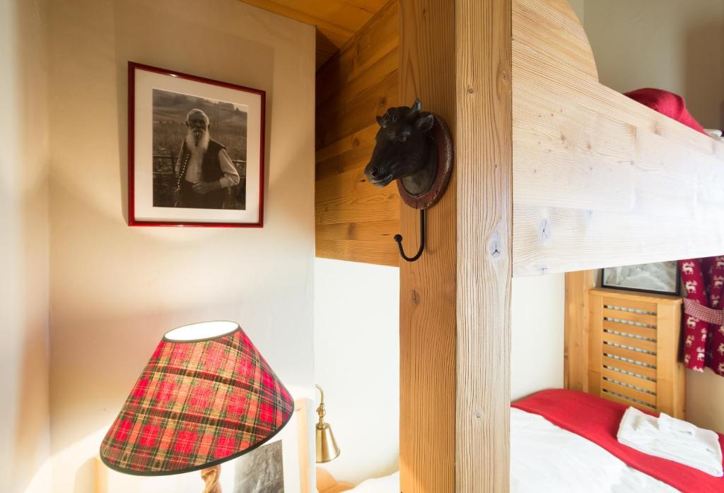 Postel nebo postele na pokoji v ubytování Apartments Roxes