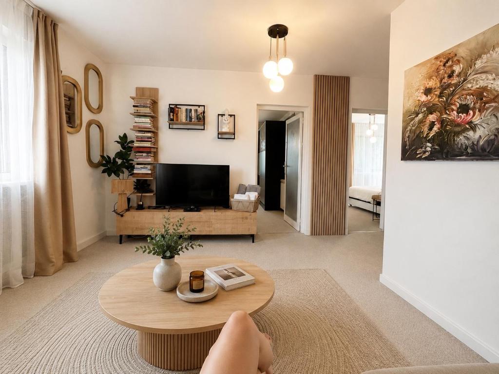a living room with a couch and a table at Guest House Rila in Govedartsi